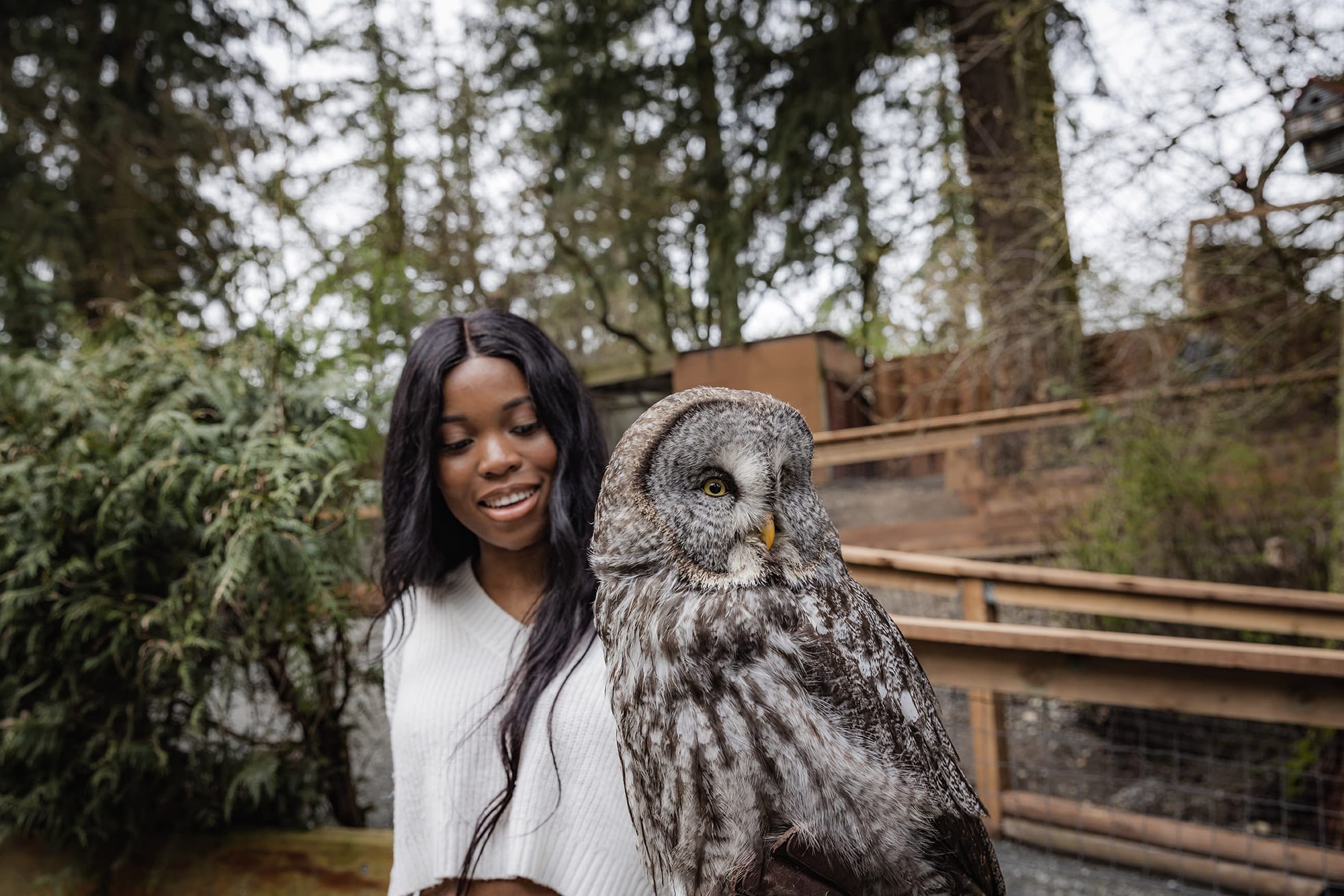 Woman Holding Owl at Raptor Centre